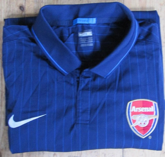 Preview of the first image of Nike Fit Dry ARSENAL Navy Striped Shirt (incl P&P).