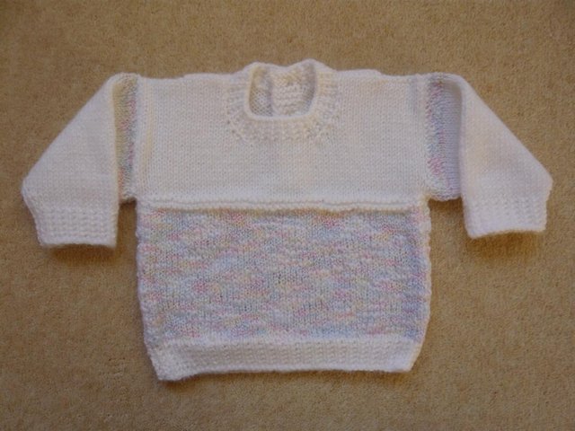 Preview of the first image of Jumper - baby girl, brand new, hand knitted.