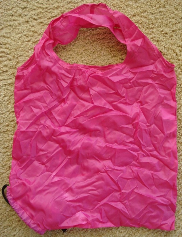 Preview of the first image of NEW  PINK “AUDLEY” FOLDING PACKAWAY SHOPPER BAG FOR HANDBAG.