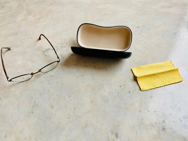Preview of the first image of Donna Karen Glasses with Case and Cleaning Cloth.