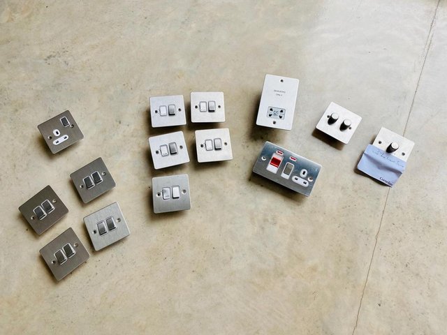 Preview of the first image of SHAVER SOCKET in Brushed Stainless Finish.SCHNEIDER ELECTRIc.