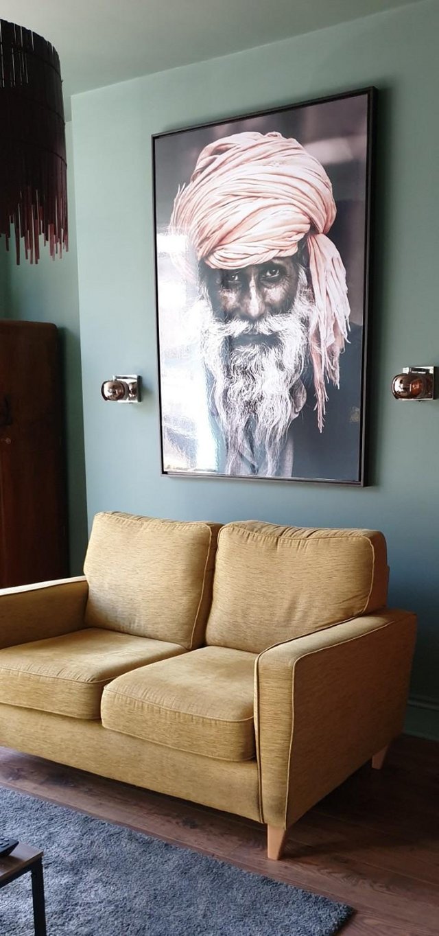 Preview of the first image of Gorgeous huge glossy Indian man framed art print.