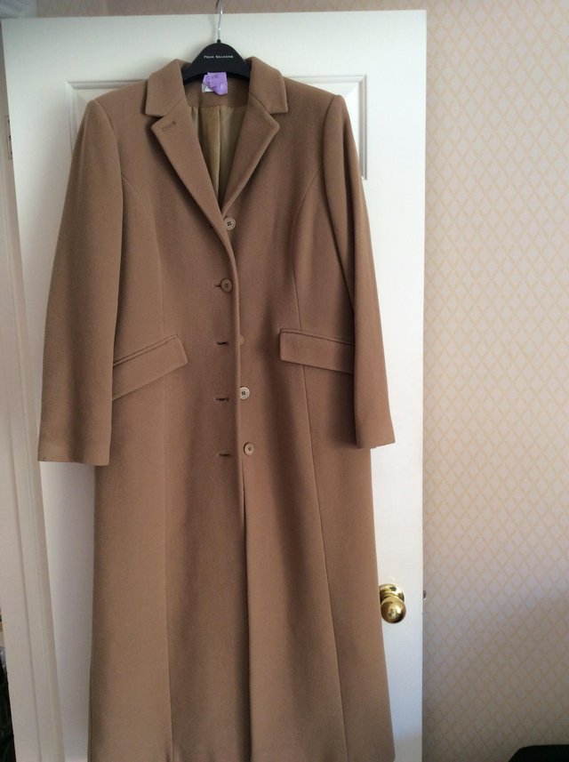 Preview of the first image of FULL LENGTH CAMEL COLOURED COAT.