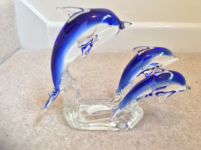 Preview of the first image of ATTRACTIVE BLUE DOLPHIN GLASS ORNAMENT.