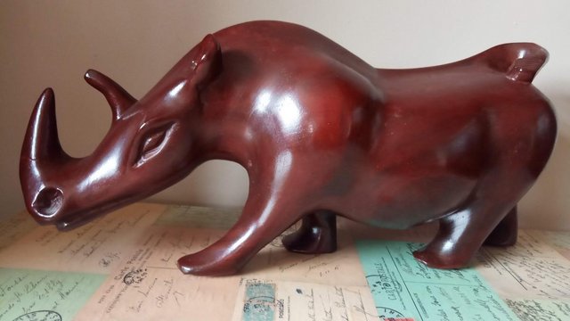 Preview of the first image of African Rhino wooden carving.