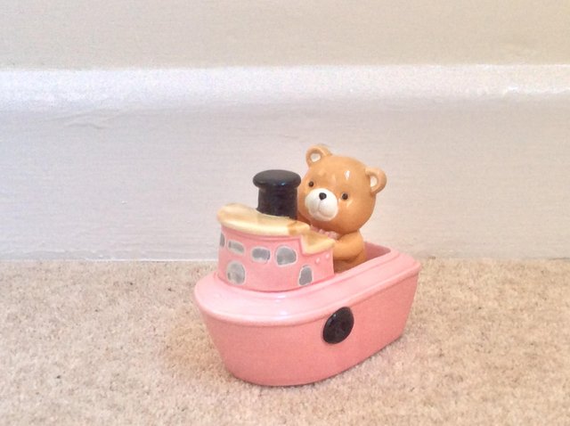 Preview of the first image of Teddy bear in pink tug boat money box.