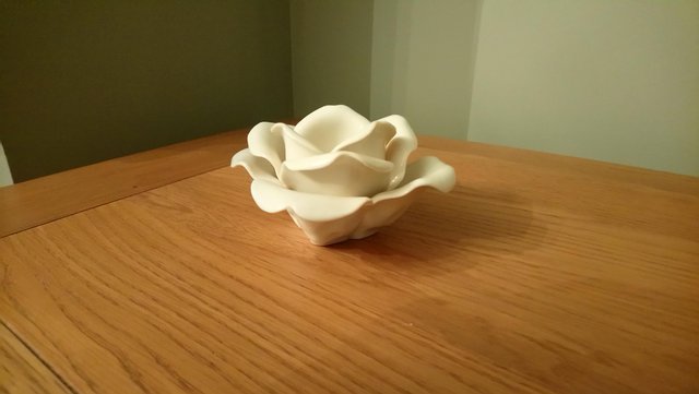 Preview of the first image of Laura Ashley ceramic tea light holder.
