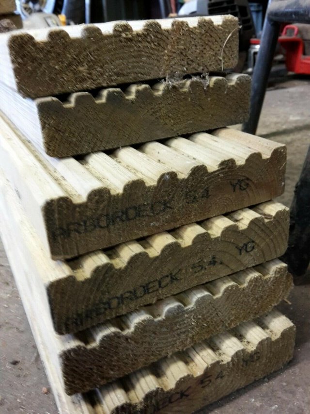 Preview of the first image of NEWTIMBER DECKING BOARDS 28MM x 120MM x 4.8M.