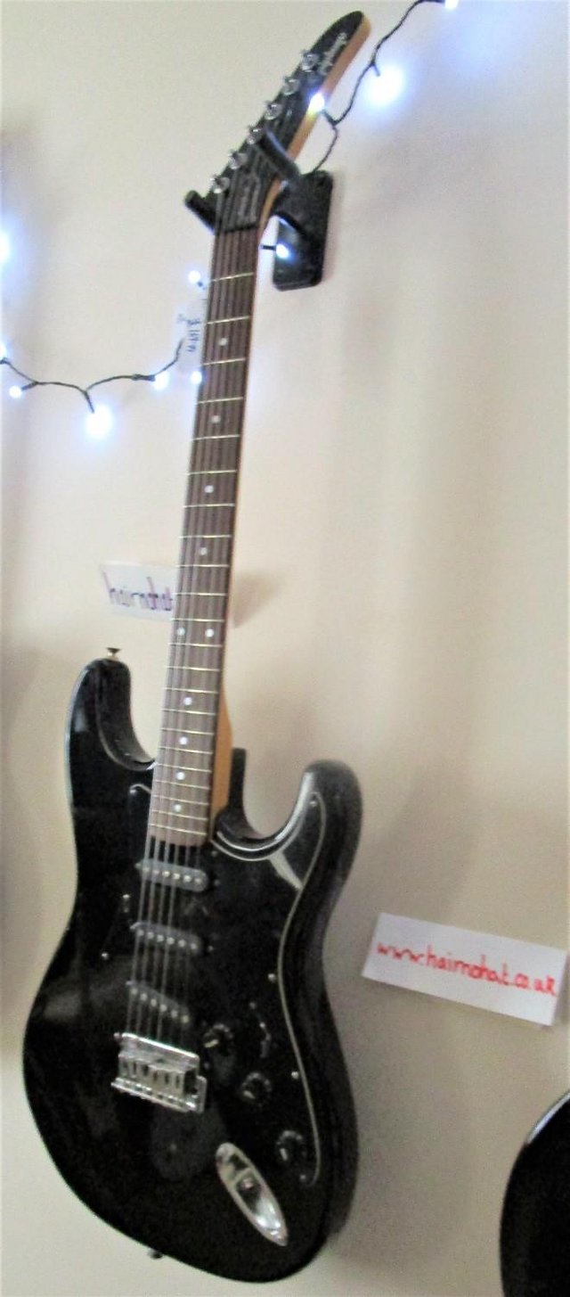 Preview of the first image of The EPIPHONE STRATOCASTER.vgc in Immaculate Black.