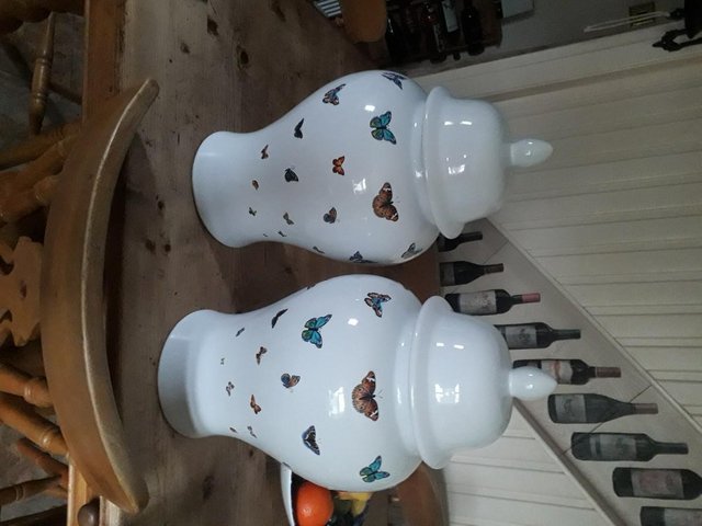 Preview of the first image of pair...of....large...decorative..vases.