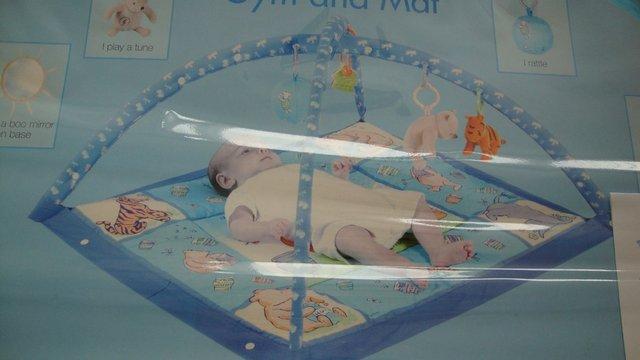 Preview of the first image of MOTHERCARE WINNIE THE POOH BABY GYM. (NEW).