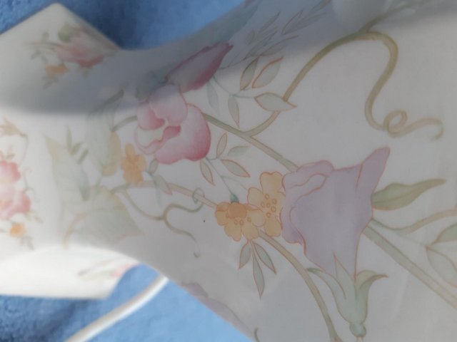 Preview of the first image of Cream ceramic Sweet pea design lamp base.