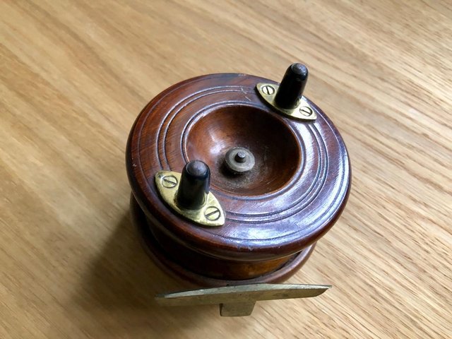 Preview of the first image of Vintage (pre-WWII) Wooden and Brass Fishing Reel.