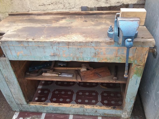 Preview of the first image of Carpenters work bench from the early 1900's with 20 old tool.