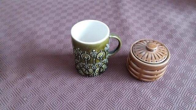 Preview of the first image of SECLA POTTERY POT WITH LID AND MUG.