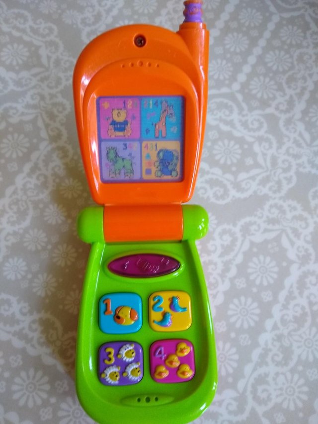 Preview of the first image of Mobile phone and Disney princess wand.