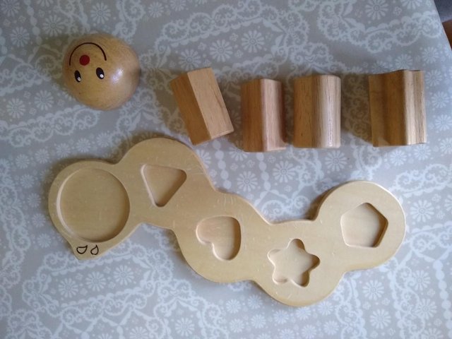 Preview of the first image of Wooden shapes incl caterpillar shape.