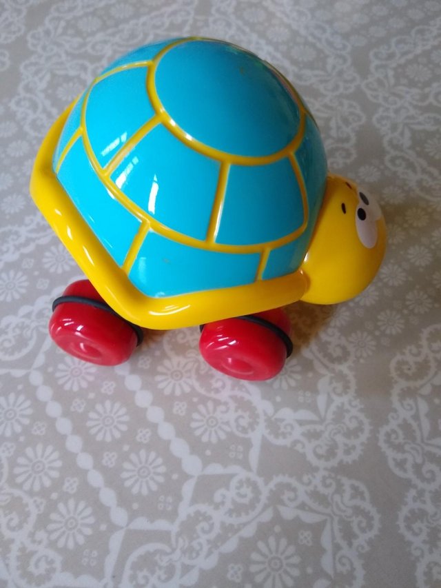 Preview of the first image of Push along tortoise and rattle set.