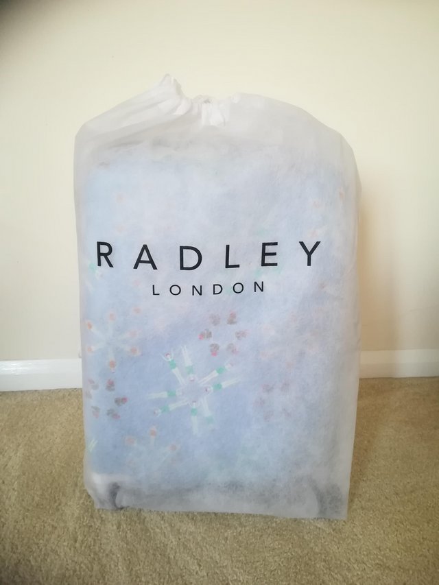 Preview of the first image of New RADLEY suitcase with small pouch and passport cover.