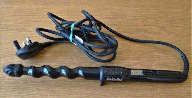Preview of the first image of Hair straightener & hair curling tongs.