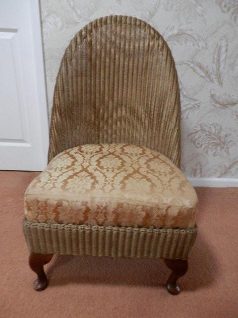 Preview of the first image of Lloyd Loom Chair-Gold Upholstery.