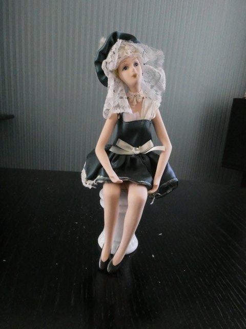 Image 2 of Antique articulated china painted doll on pedastal seat