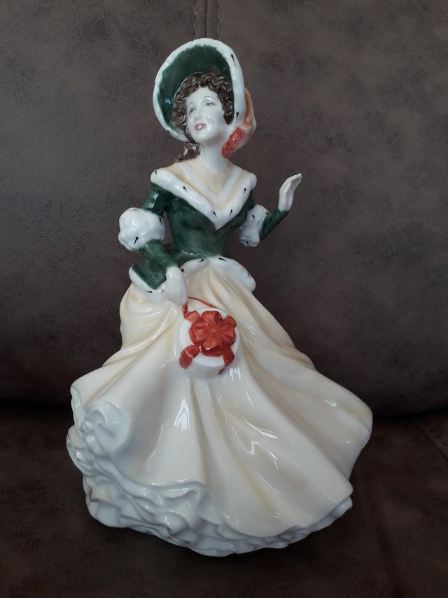 Preview of the first image of Royal Doulton Classics Christmas Day 2002 Figurine.
