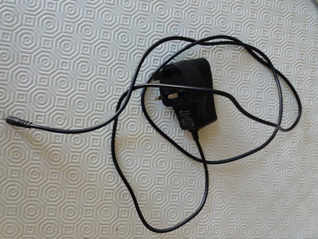 Preview of the first image of Black Foscam SAW-0502000 5V 2000mA UK Mains AC-DC Adaptor.