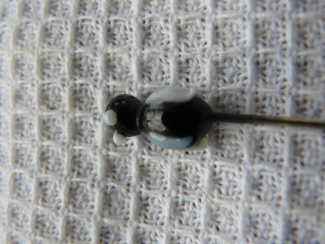 Image 6 of Antique metal hatpin with small black & white glass penguin