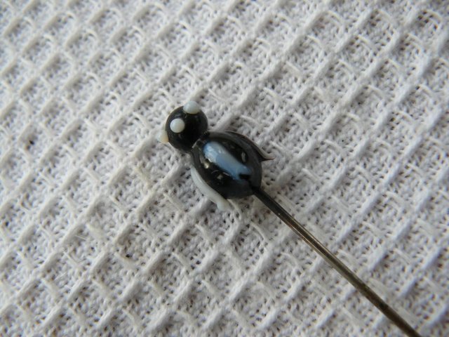 Image 9 of Antique metal hatpin with small black & white glass penguin