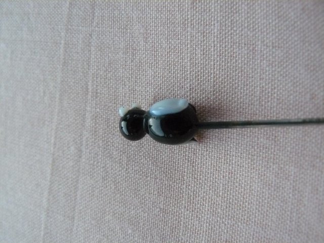 Image 10 of Antique metal hatpin with small black & white glass penguin