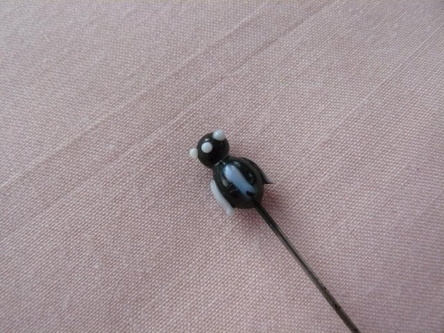 Image 11 of Antique metal hatpin with small black & white glass penguin