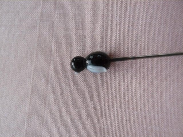 Image 12 of Antique metal hatpin with small black & white glass penguin
