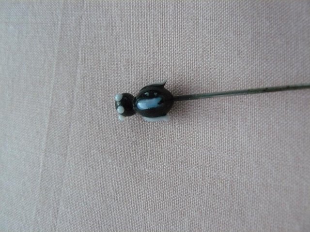 Image 14 of Antique metal hatpin with small black & white glass penguin