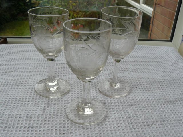 Preview of the first image of 3 antique etched grape design sherry/liqueur glasses c1900s.