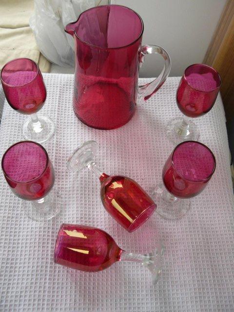 Preview of the first image of Victorian 6 ruby iridescent glasses & 1 ruby glass jug.