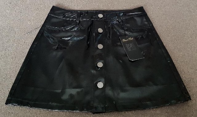 Preview of the first image of BNWT Pretty Little Thing Black Vinyl Mini Skirt - Size 14.