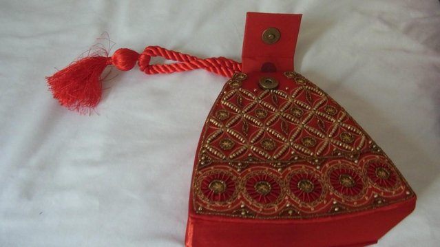 Preview of the first image of Red embroidered bag - new, unused..