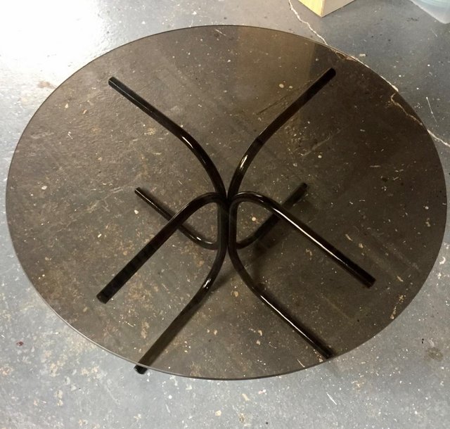 Preview of the first image of Round glass topped occasional table.
