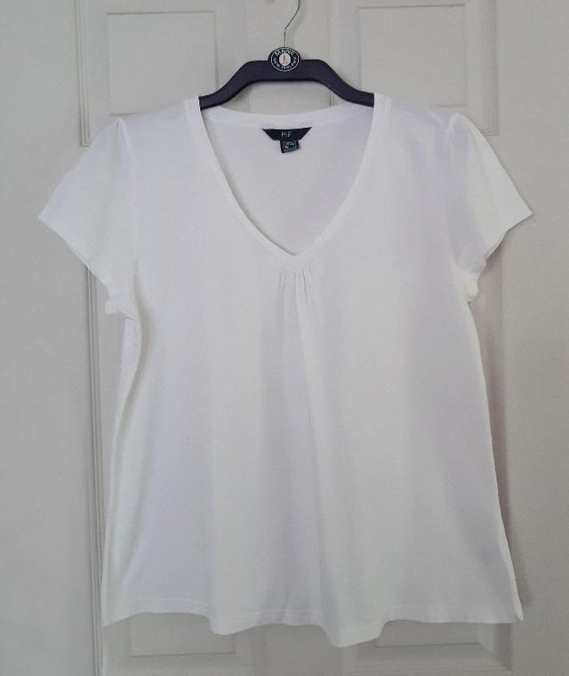 Preview of the first image of Lovely Ladies White Florence & Fred T Shirt - Size 20.