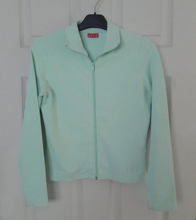 Preview of the first image of Lovely Ladies Zip Up Top By Elle - Size Uk 10.