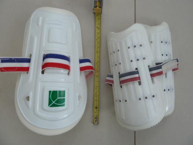 Preview of the first image of 1 pair children's sports shin pads  + 2 pairs hockey socks.