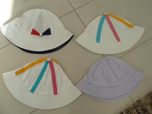 Preview of the first image of 4 x child's sunhats, nearly new.