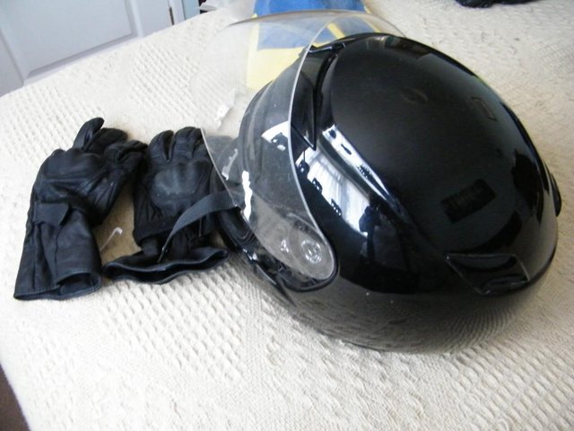 Preview of the first image of MENS motorcycle helmet and gloves.