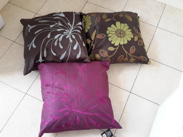 Preview of the first image of Cushions x 3 brand new.