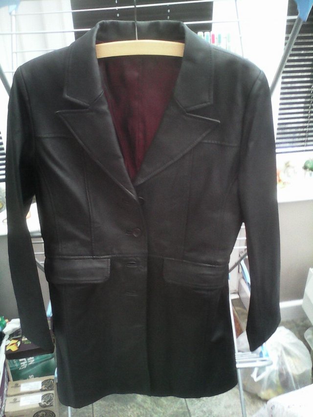 Preview of the first image of BLACK LEATHERSIZE 10 VINTAGE 1980's FREEMANS AS NEW.