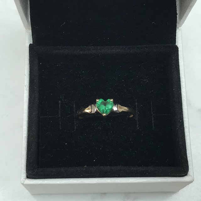 Preview of the first image of Green stone 9ct impressed mark ring.