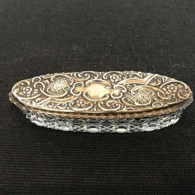 Preview of the first image of Trinkets Silver Lady’s dressing table tops box.