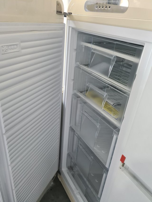 Preview of the first image of SMEG RETRO STYLE 50'S LEFT HAND UPRIGHT CREAM FREEZER-GRADED.
