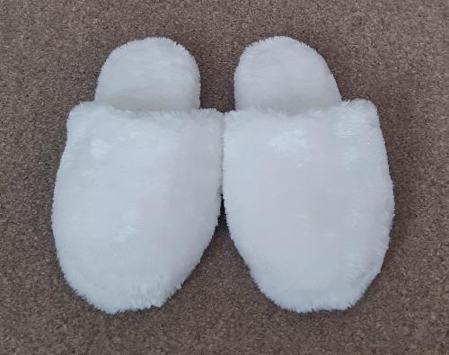 Preview of the first image of Brand New Ladies White Faux Fur Slippers - Size M(4-7).